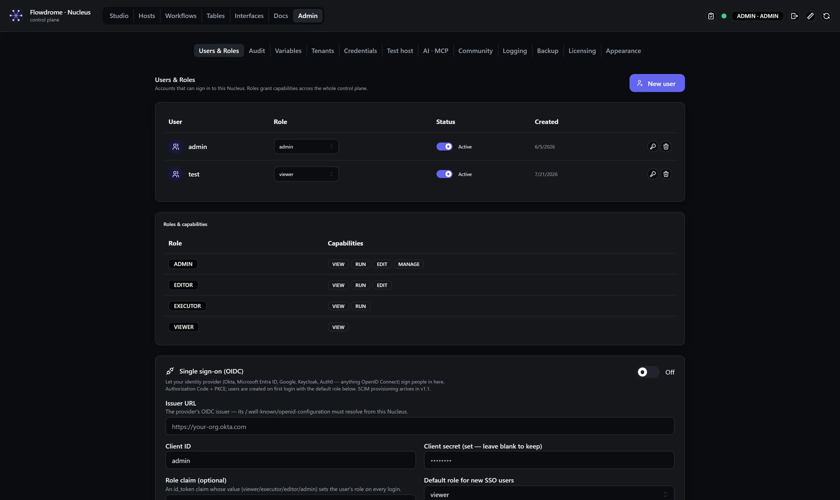 The Single sign-on settings section in Admin → Users & Roles: enable toggle, issuer URL, client ID, write-only client secret, role claim and default role fields